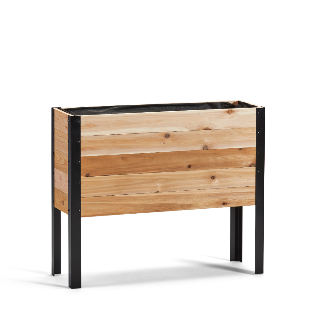 Wooden planter box with black metal legs on a white background