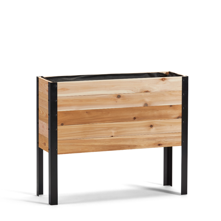 Wooden planter box with black metal legs on a white background